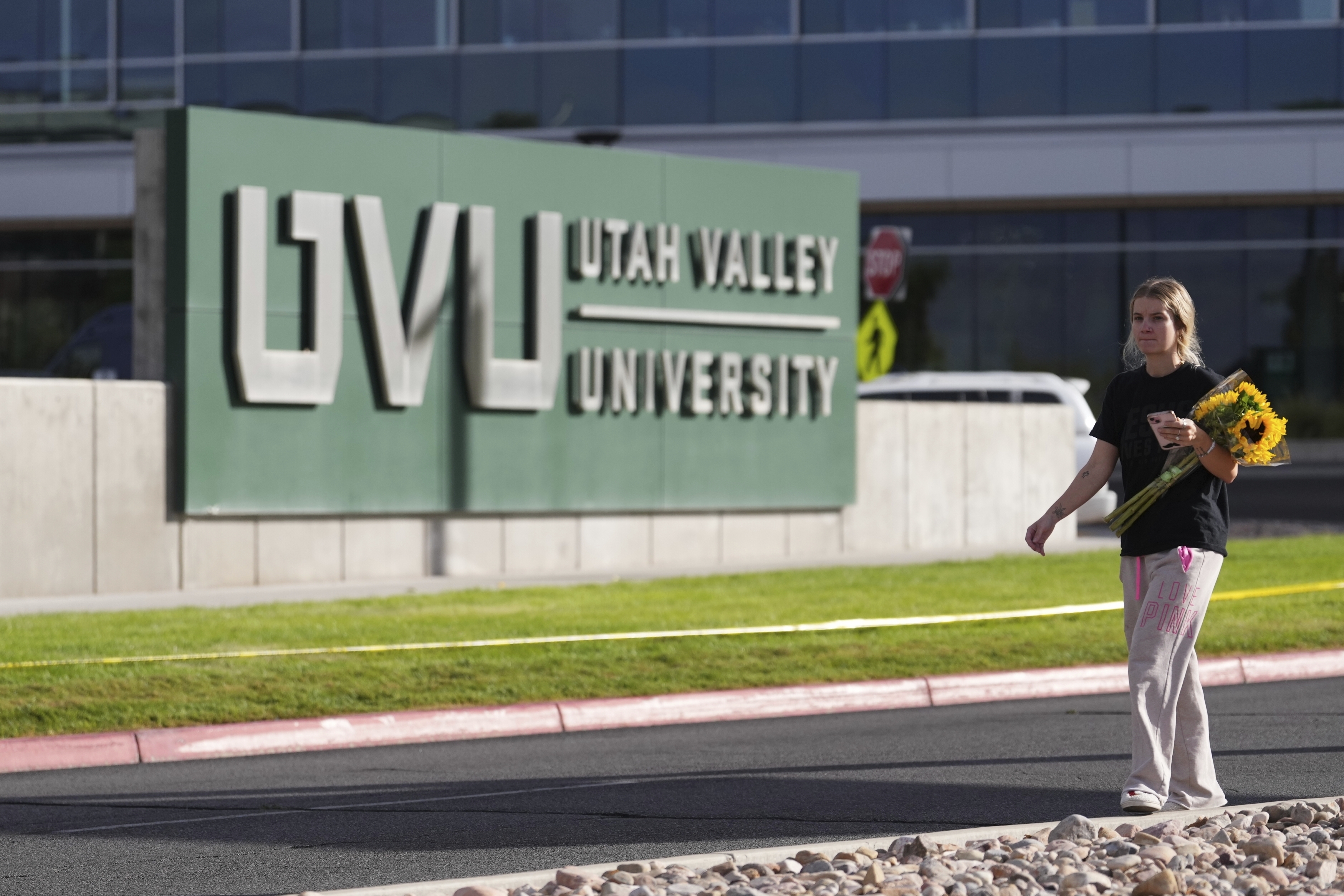Meagan Bradley walks to a memorial for Charlie Kirk at Utah Valley University in Orem, Utah, Friday, Sept. 12, 2025.